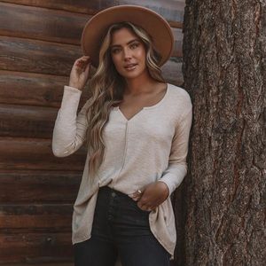 | asymmetrical hem tunic with pockets |